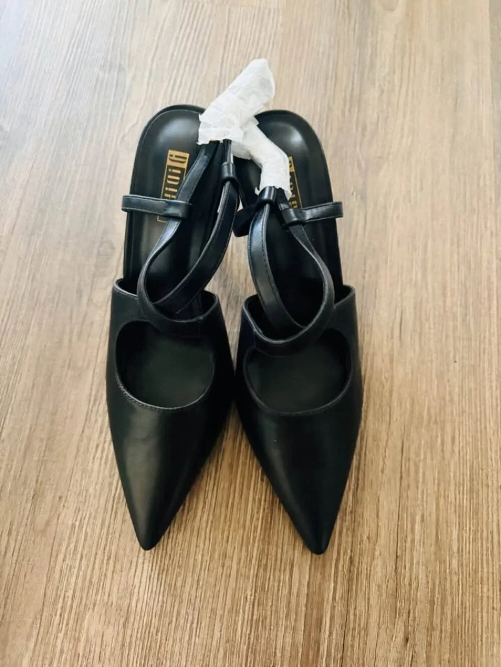 black slingback pointed-toe flats from